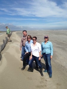 Simone Maloz (in white) standing on the newly restored Caminada Headland.